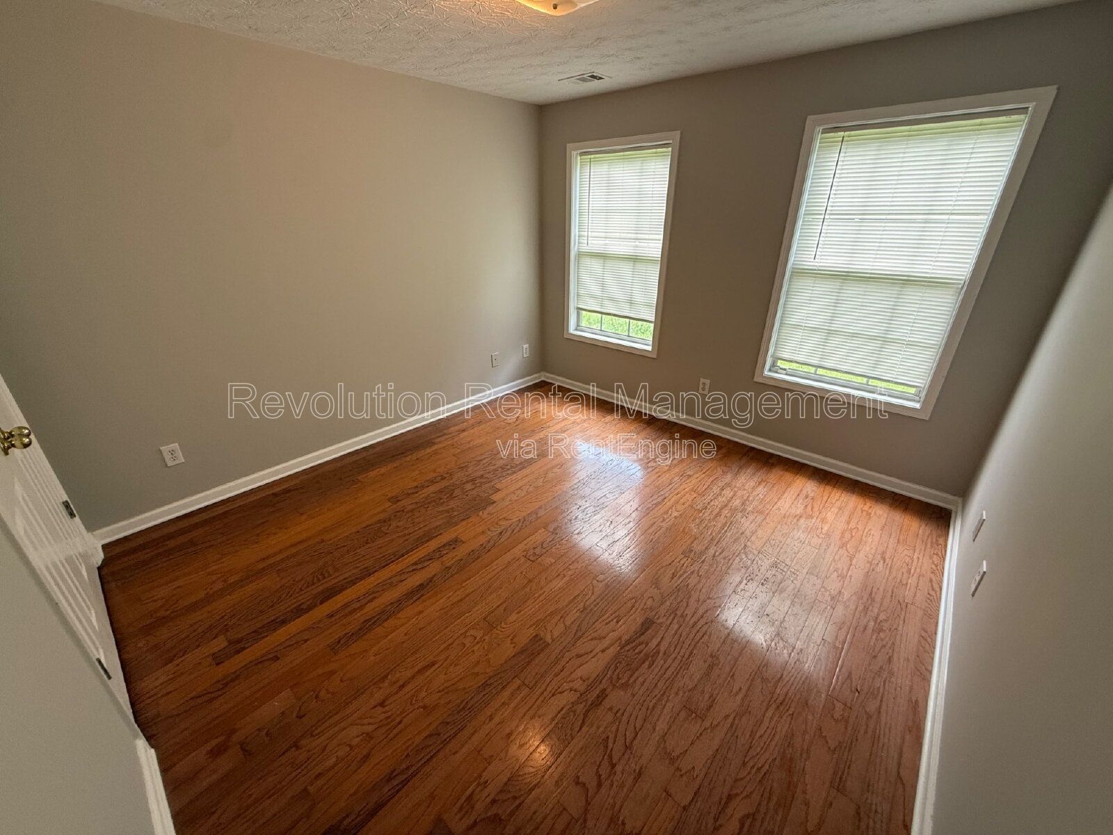 1,268 Sq Ft Single-Family Home in Covington, GA | Deck, 2-Car Garage & Fireplace property image
