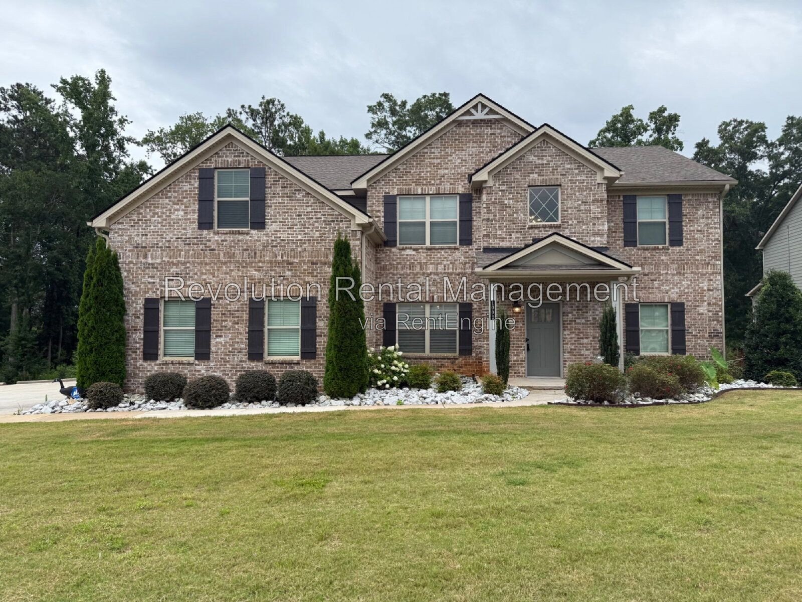 Spacious 3,578 Sq Ft Two-Story Home with Basement in Traditions at Crystal Lake — Hampton, GA property image
